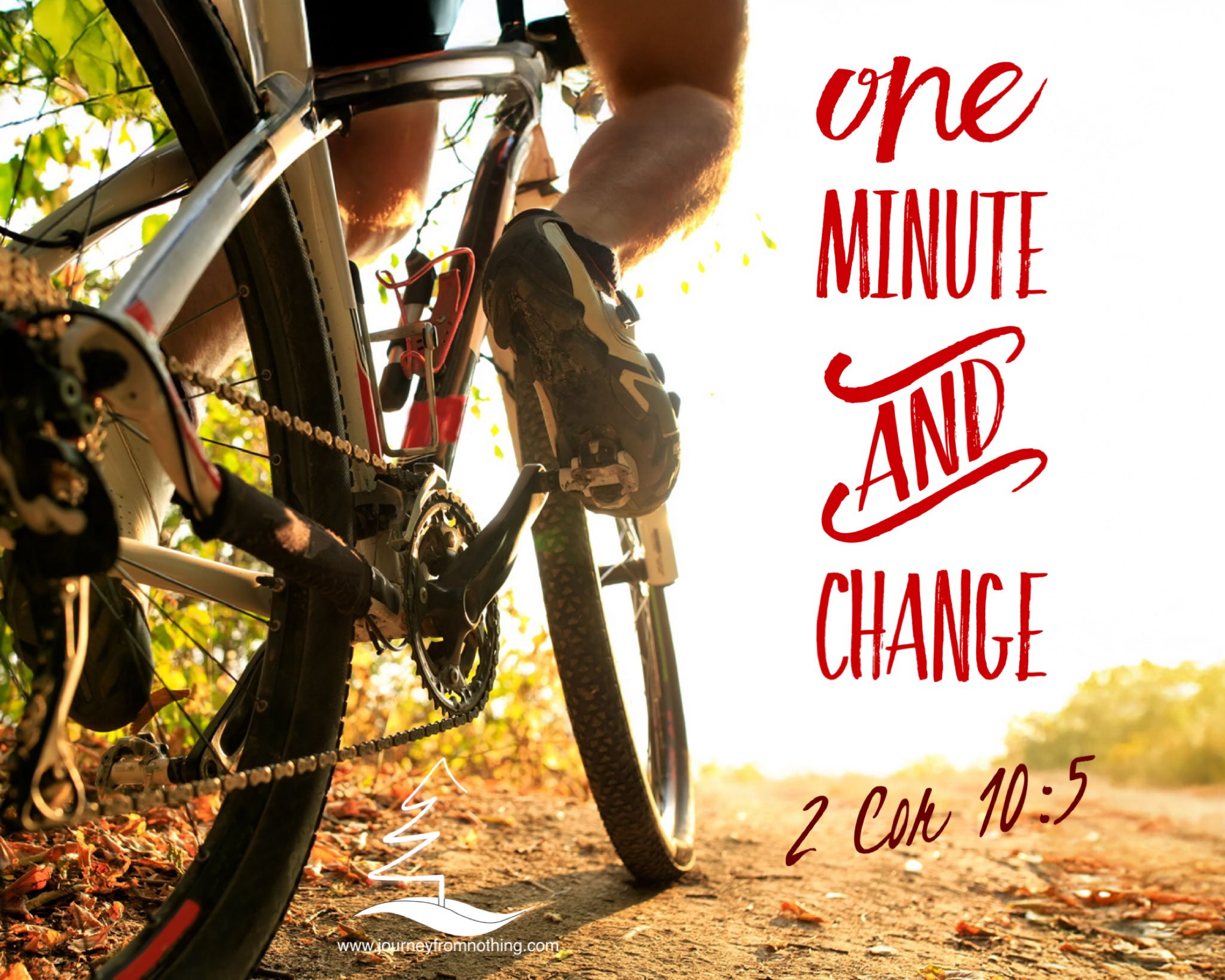 Cyclist going up a hill on a dirt road on a mountain bike