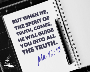 Image of an open notebook with John 16:13